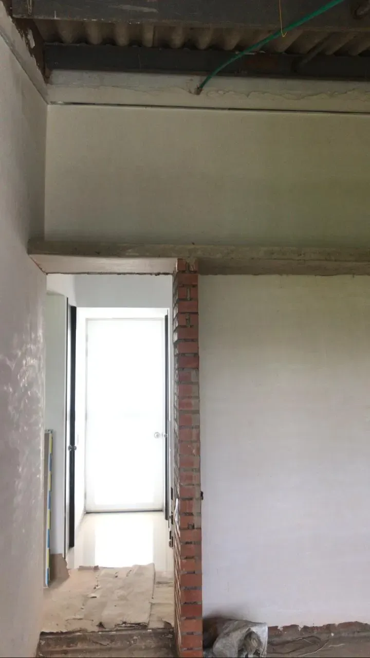 Obra blanca de ampliación de closet en casa en Cali, remodelación ejecutada por CAMARK Projects